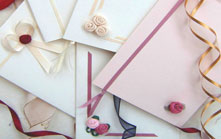 A collection of handmade wedding stationery created from the finest quality ribbons.