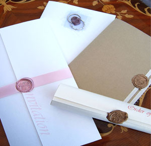Wax sealed wedding stationery - invitations and scrolls.